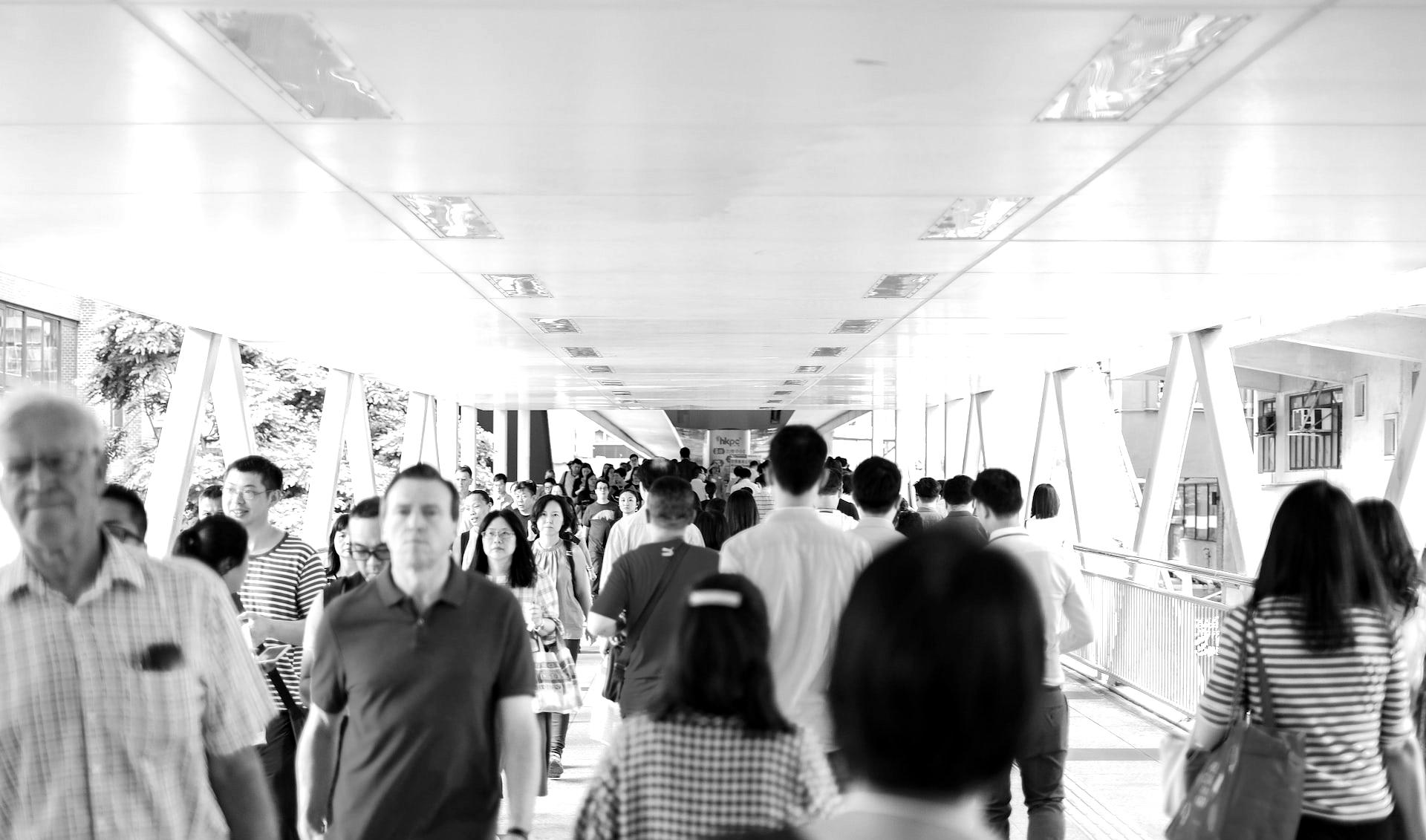 group of people walking inside building